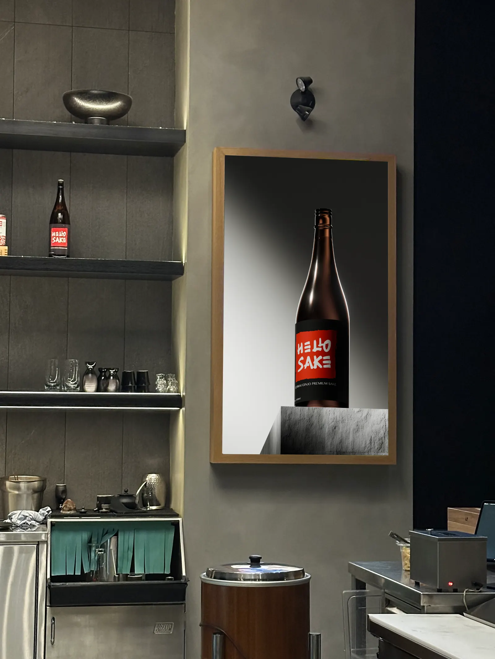 The bottle render displayed on a framed screen inside the Hello Nori restaurant